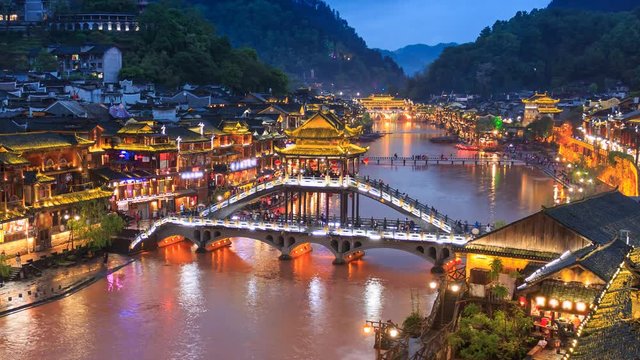 Fenghuang County Beautiful Ancient Town Of Hunan Province, China 4K Day To Night Time Lapse