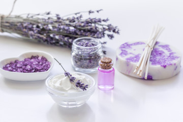 Fototapeta na wymiar body cream with lavender herbs cosmetic white background
