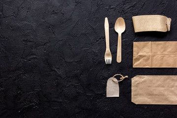 paper bags, fork and spoon for take away set top view space for text