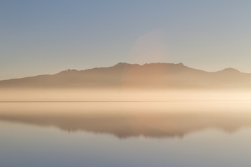 Sunrise reflection in the Salar de Uyuni, Potosi Department, Bolivia