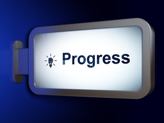 Business concept: Progress and Energy Saving Lamp on billboard background