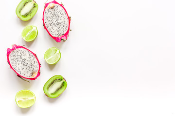 summer pattern with kiwi and pitaya white background top view mock up