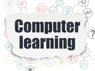 Learning concept: Computer Learning on Torn Paper background