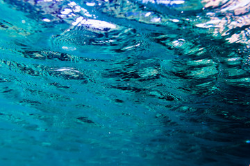 Fototapeta na wymiar Water texture in blue ocean. Underwater in sea