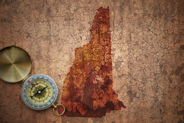 Fototapeta na wymiar map of new hampshire state on a old vintage crack paper