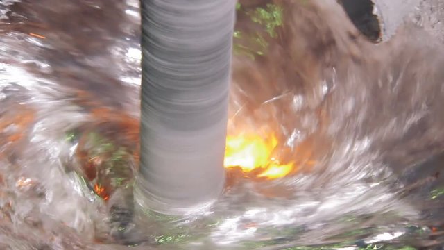 panorama of mixing liquid aluminium in bowl in metallurgical department on car factory
