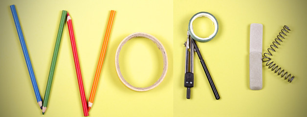 надпись работа на ярком фоне выложена из канцелярских...