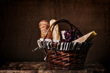 bread and cheese in a basket