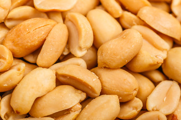 Fototapeta na wymiar Roasted peanuts close up