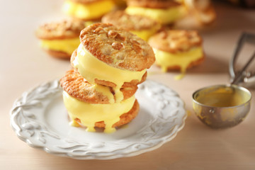 Delicious lemon ice cream cookie sandwiches on kitchen table