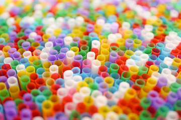 Fototapeta na wymiar Many colorful straws for drinks, closeup