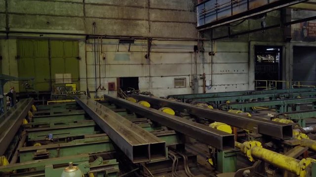 Old factory of auto components production. Warehouse of an aluminum pipes. the production of metal pipes. Pipe welding. Industrial zone, Steel pipelines and equipment. Metal pipes in a warehouse