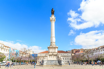 Fototapeta na wymiar Statue of Dom Pedro IV at Rossio Square in downtown Lisbon, Portugal.