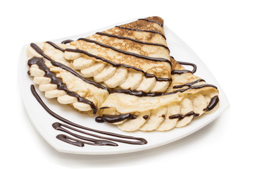 Crepes with chocolate cream and banana