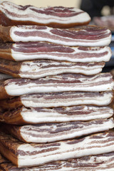 Home made smoked bacon cut into pieces