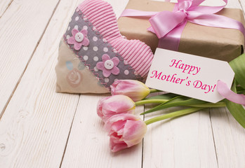 beautiful tulips with gift box. happy mothers day, romantic still life, fresh flowers.