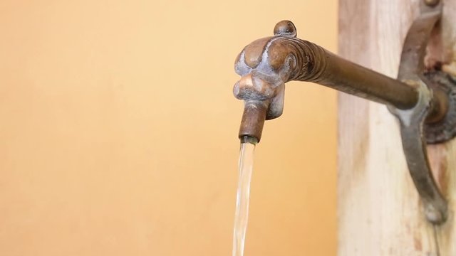 Source of welfare - fresh cold water bubbling out of a dragon's head