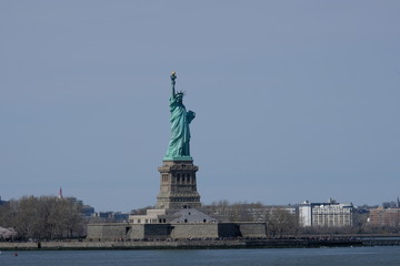 Statue of Liberty against blue sky