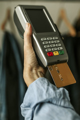 closeup of purchases with credit card