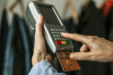 closeup of purchases with credit card