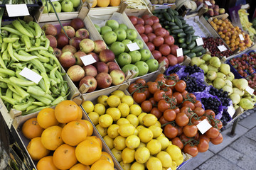 Big assortment of fresh organic fruits. Frame composition of fruits on market stall