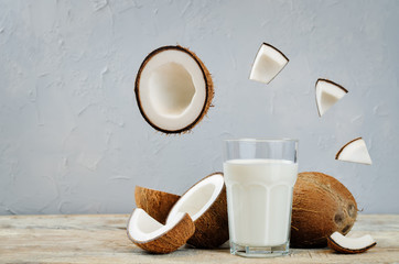 Coconut milk with coconuts and flying slices