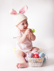 Baby girl in a rabbit hat