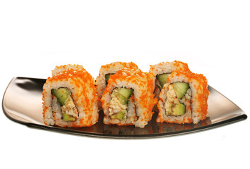 japanese  rolls on black plate.