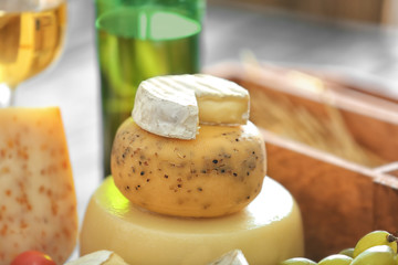 Different types of cheese on table, closeup