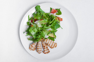 chicken bbq with salad;