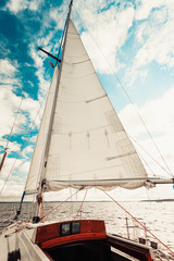 Yachting on sail boat during sunny weather