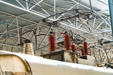 Electric train trolley pole. high speed railway electrification system. Overhead cable wire over...