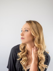 Naklejka premium blond woman on a white background 