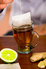 Deleighful cup of tea with ginger and lemon home antimicrobial therapy