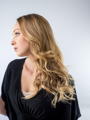 Obraz premium blond woman on a white background 