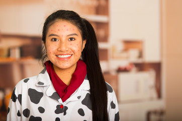 Portrait of happy young girl with skin problem