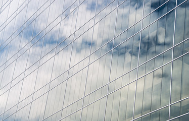 Fototapeta na wymiar clouds reflected in a modern office building, Quito, Ecuador