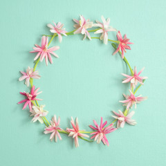 Lovely pink flowers arranged to circle border with copy space in the centers as a mother day card, wedding invitation card, anniversary, add the quote and special occasionally