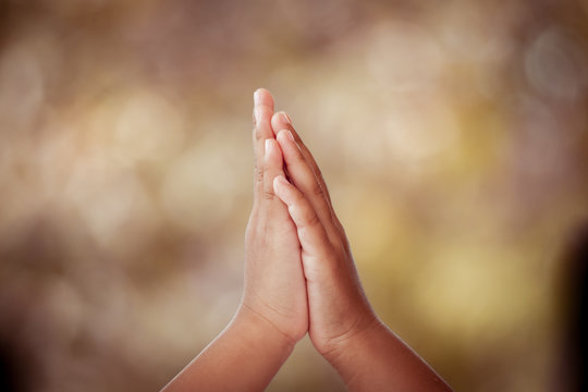 Two Children Making Hi Five Gesture In Vintage Color Tone