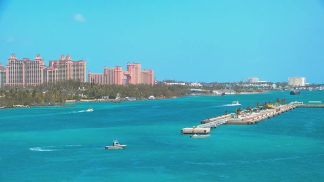 Port of Nassau Bahamas with Atlantis Resort Background in a Tropical Exotic Setting with Vibrant Turquoise Blue Island Water on a Sunny Day