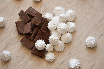 Heart of dark chocolate and white meringues