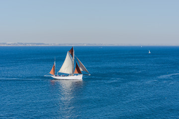 Fototapeta premium Brittany, Atlantic sea in summer, old tuna boat sailing