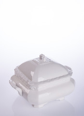 Obraz premium pot or ceramic food pot on a background.