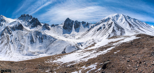 Panorama of the peaks of the Eastern Sayan mountains