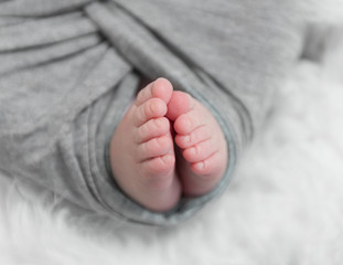 Tiny little toes of an infant sleeping