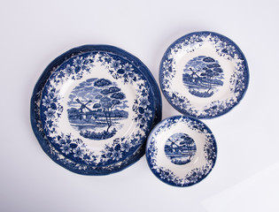 plate or flowers on plate painted by hand on background.