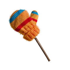 Winter mitten, knitted, isolated on white background. Alone on the twig