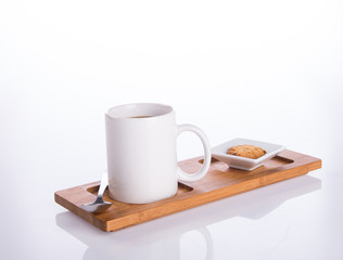 coffee or coffee with cookies on background.
