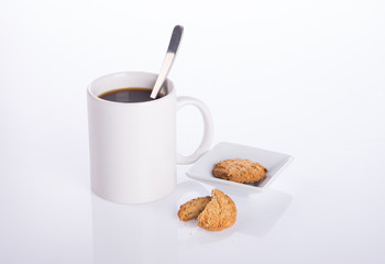 coffee or coffee with cookies on background.