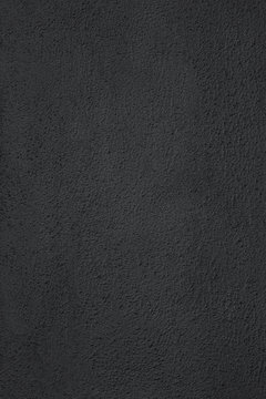 Black color  stone texture with grain. Distress textured Grainy Wall .